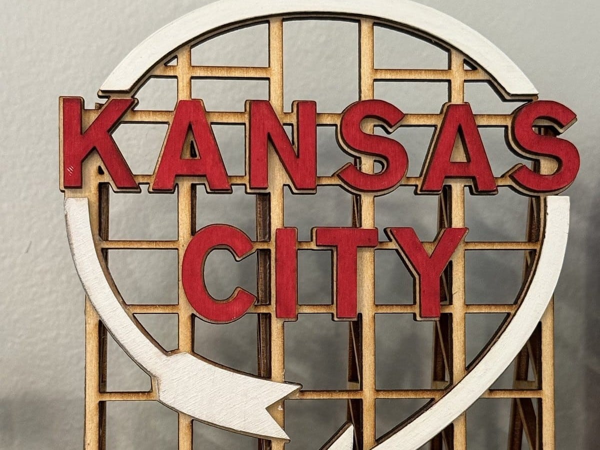 Laser-cut Kansas City sign art in the VOLTAGE office